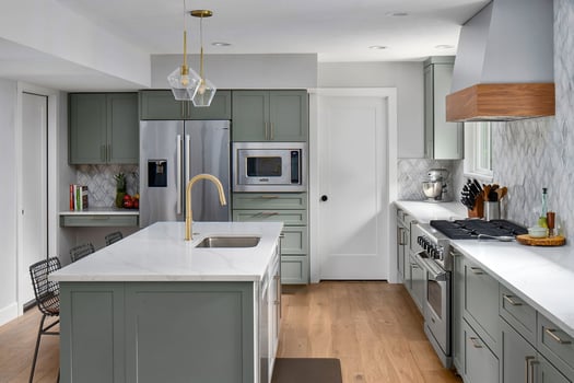 Redesigned kitchen with sage colored cabinets