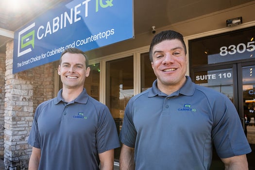 Cabinet IQ founder standing outside storefront