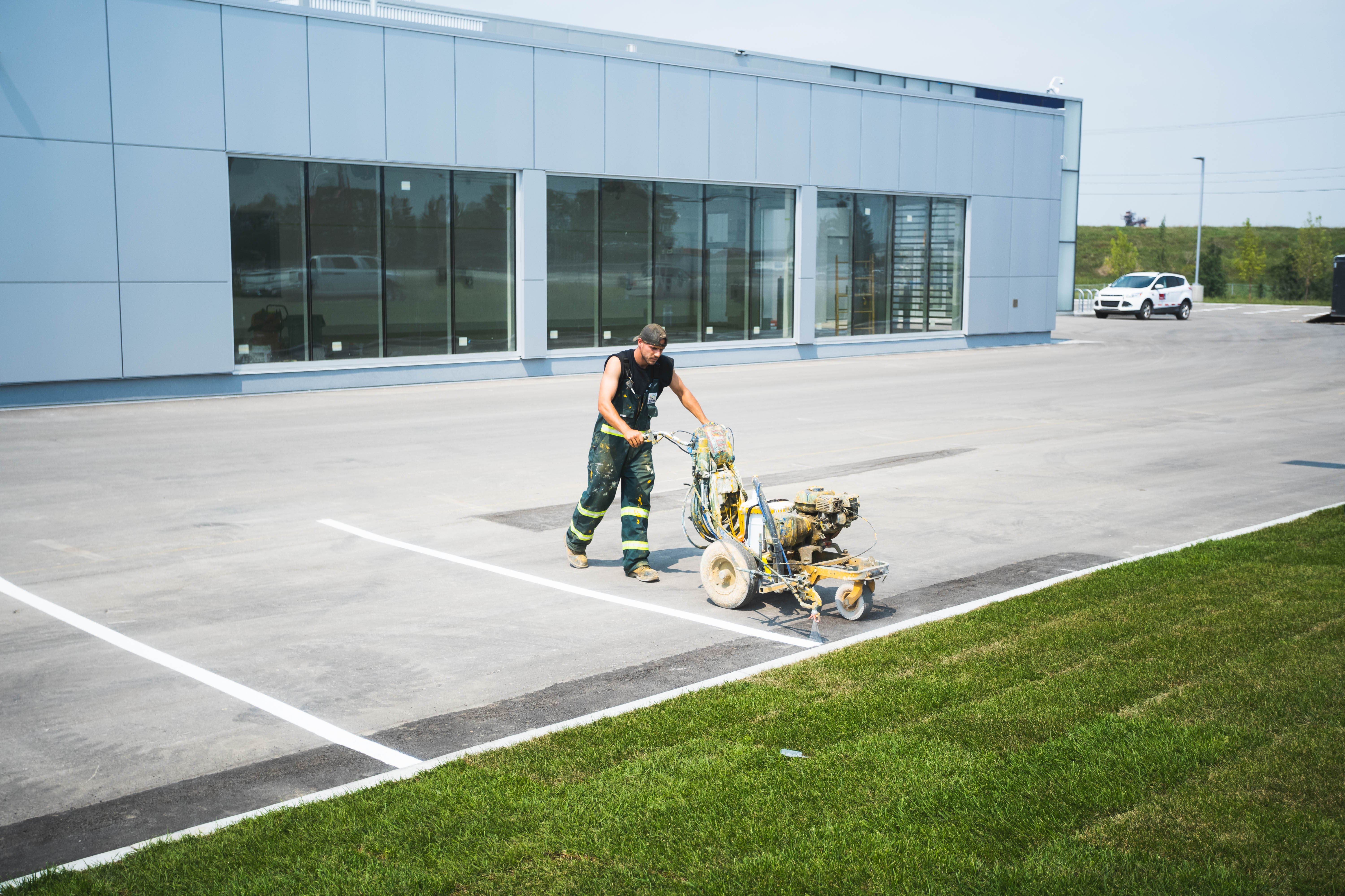 Everline striping a Volvo dealership
